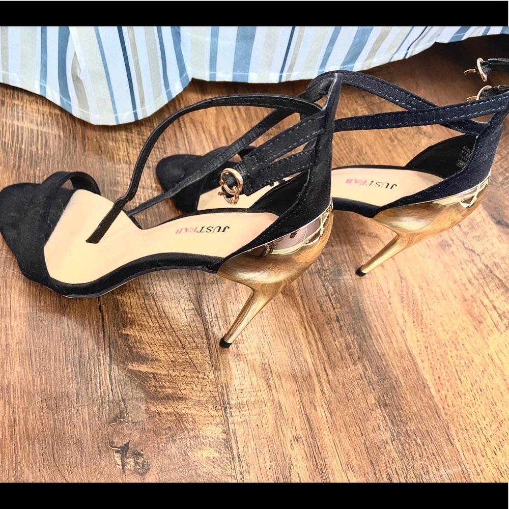 Black and gold heels